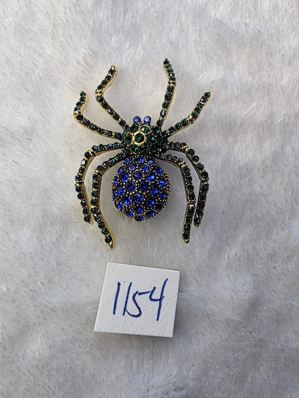 Sparkling Spider Brooch with Blue and Green Rhinestones